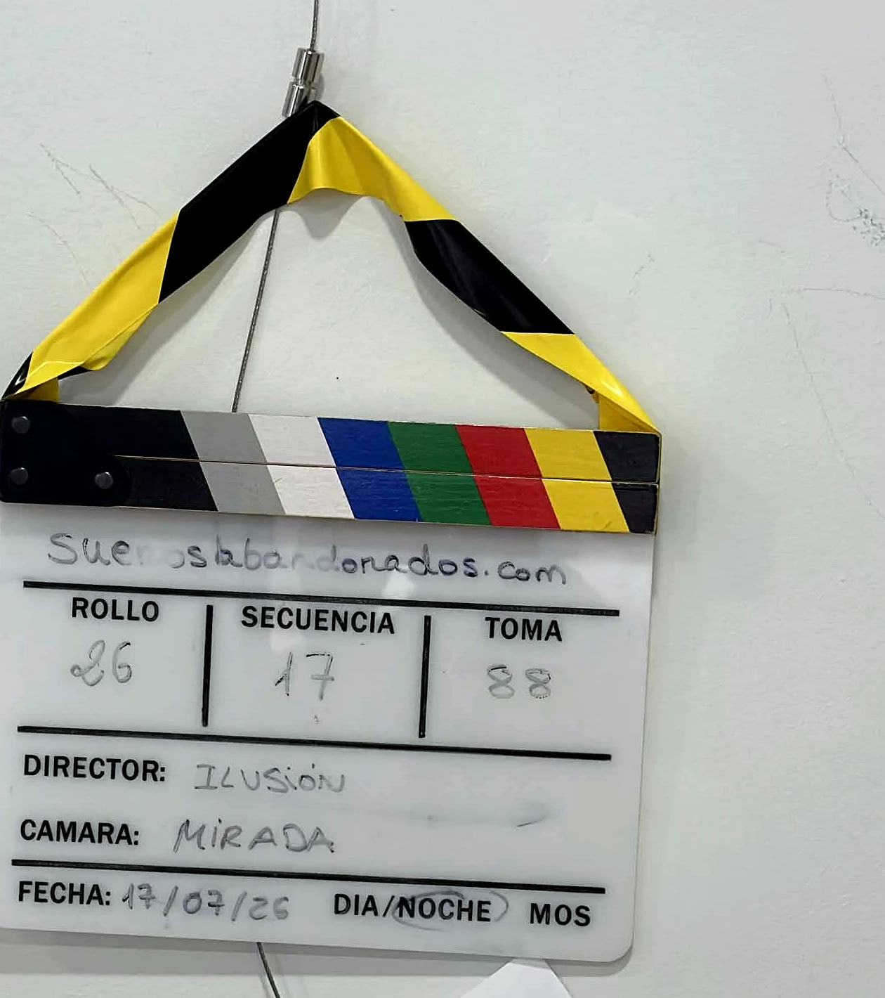 Claqueta cinematográfica que representa el sueño de ser actriz
